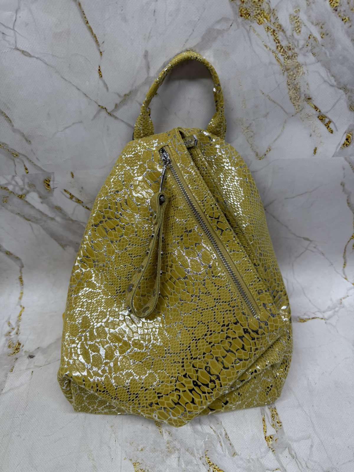 0-02-05-d960add50286bc2cc98968bf3def9beafb47f7c94711ead0e28d9cb4907c4844_38f7c1280f63308 Шкіряний рюкзак-трансформер - Зображення 1